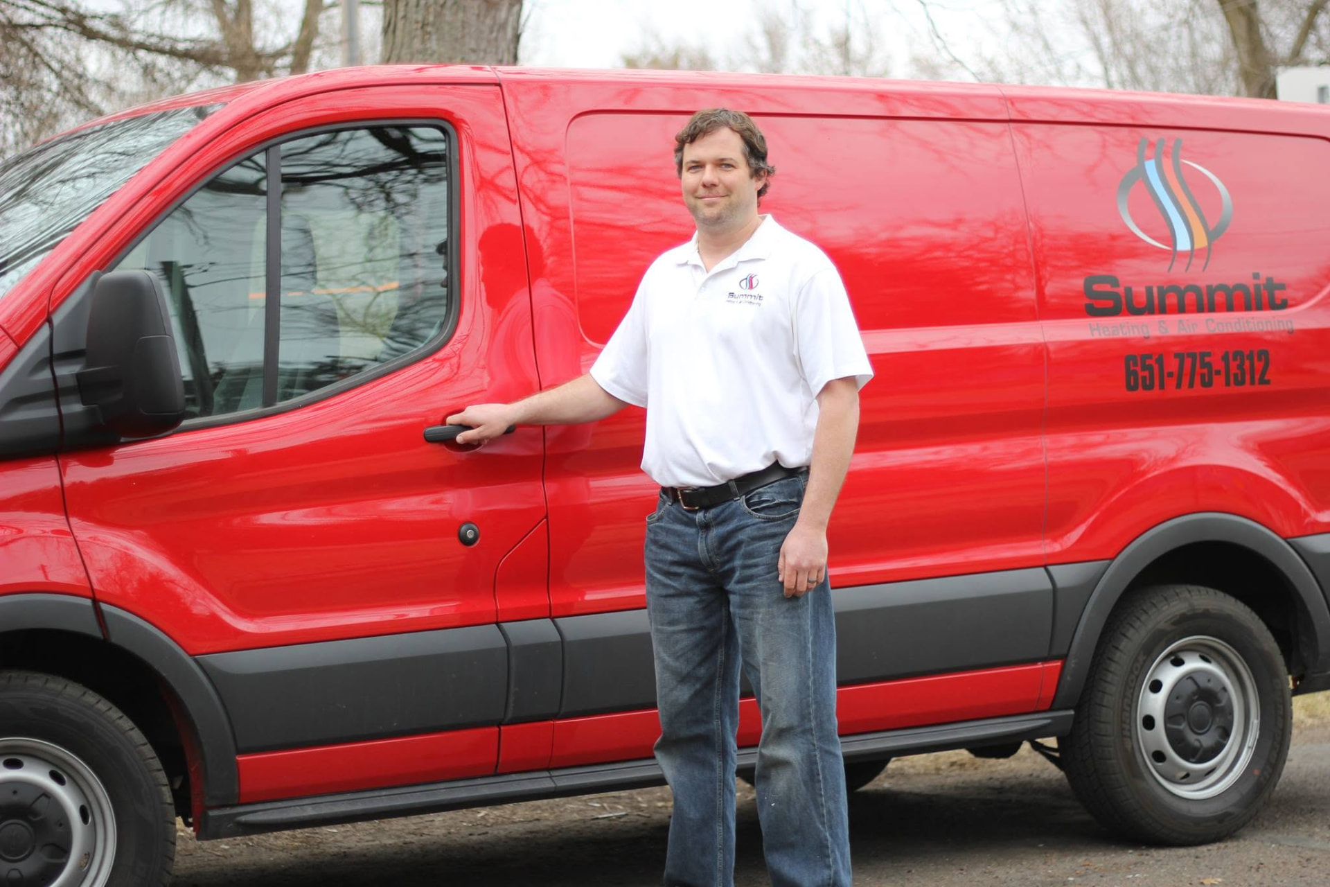 Josh Mahoney with the Summit Heating & Air Conditioning service van